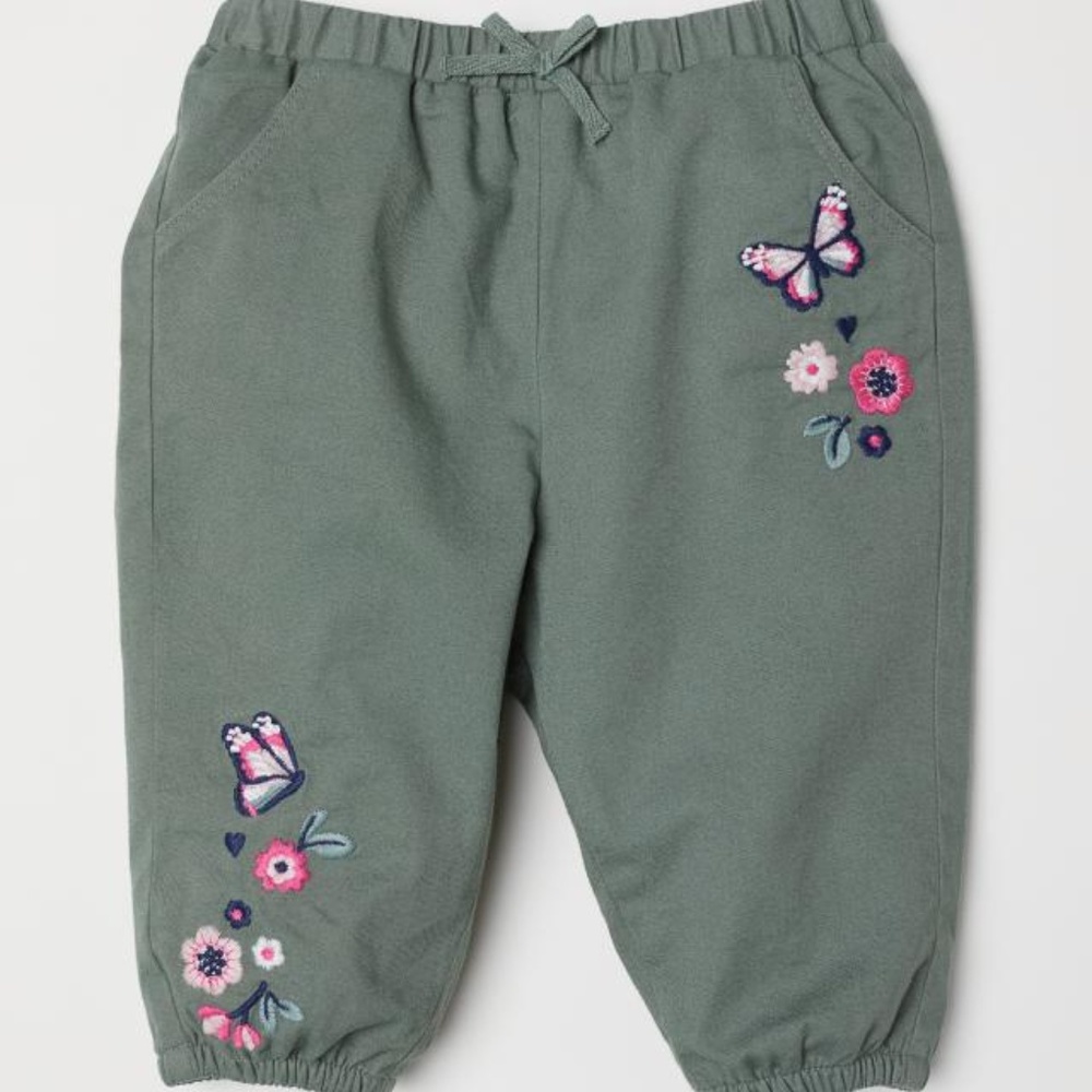 NWT  Adorable jersey-lined pull-on pants with embroidered motif